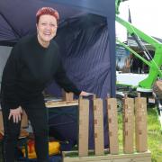 Jo Livall shows off Grown Green's tree shelters