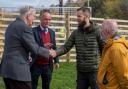 Michael Wilson of Scottish Woodlands is greeted by the Duke of Gloucester at Lauder Common, watched by Tweed Forum Director Luke Comins.