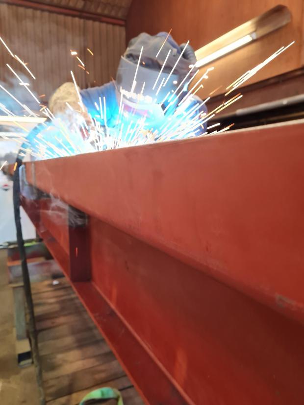 Forestry Journal: Beams were welded and bolted into two pieces for construction on site.