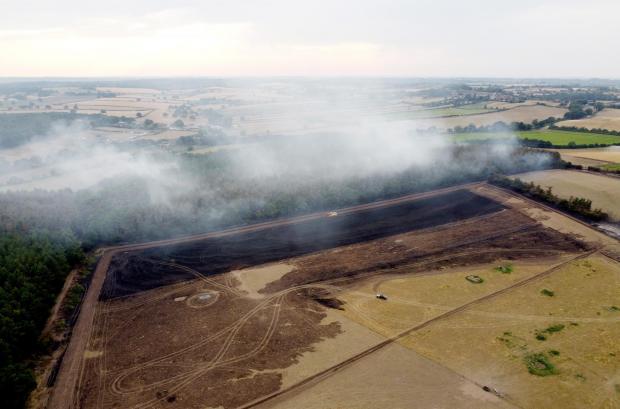 Forestry Journal: : In this aerial view, burnt woodland is seen while smoke rises from the trees following a fire on July 19, 2022 in Blidworth, England