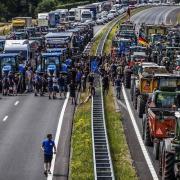 Farm vehicles stopping traffic near the border of the Netherlands and Germany (Pic: VINCENT JANNINK/ANP/AFP via Getty Images)
