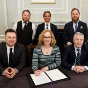 Biodiversity Minister Lorna Slater with the private investors who have agreed a £2bn climate-change deal to restore woodland in Scotland