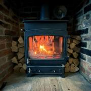 The Scottish Government has been told to clarify if wood-burning stoves are banned for new build houses